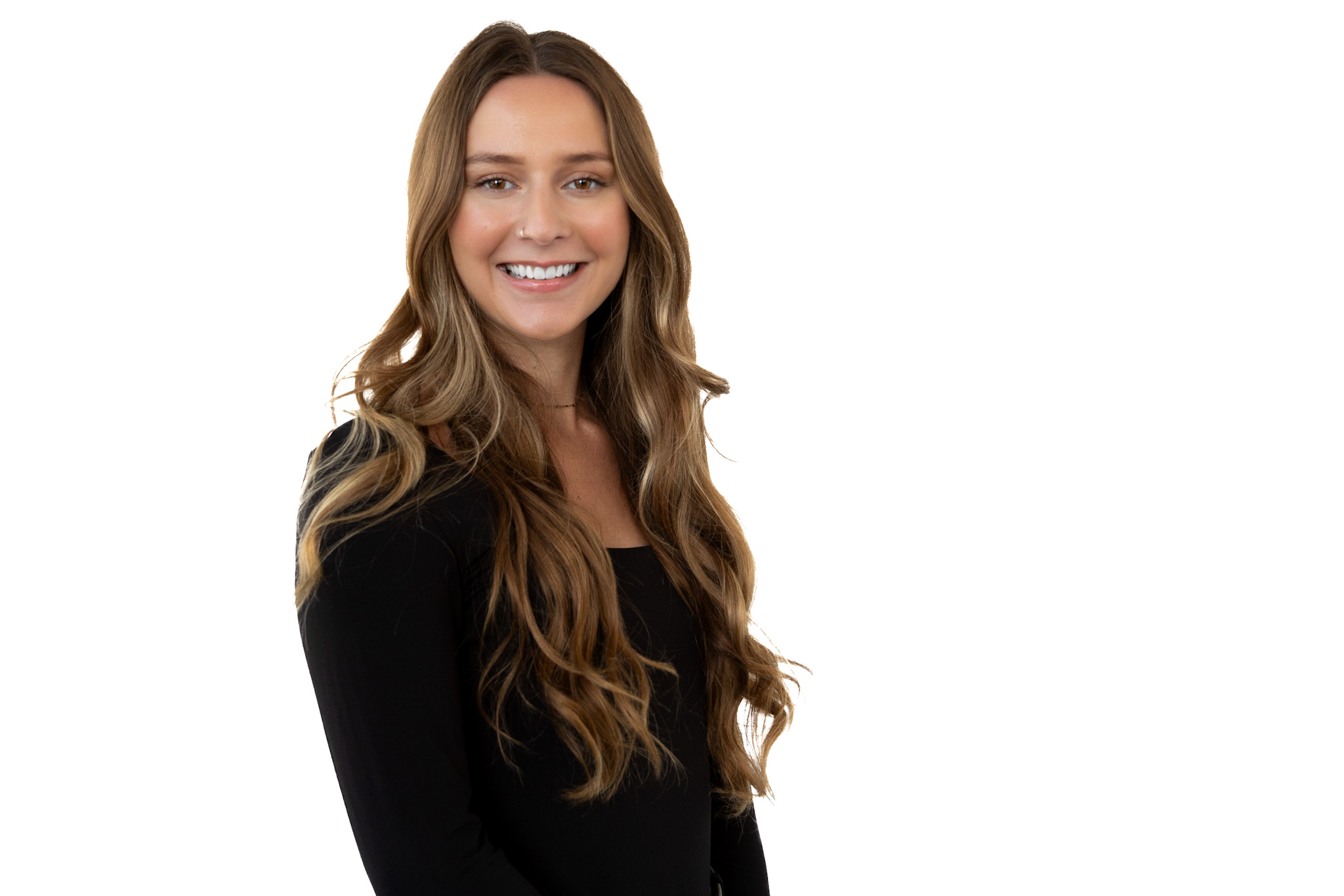 Professional mobile studio headshot of a woman on a white background for her Edmonton business.